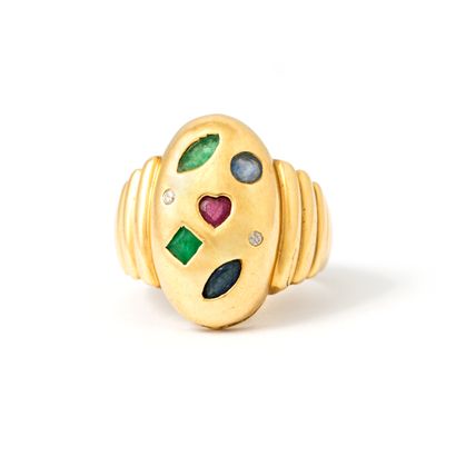 null Ring in 18K yellow gold set with emeralds, sapphires, rubies and diamonds.

Unreadable...