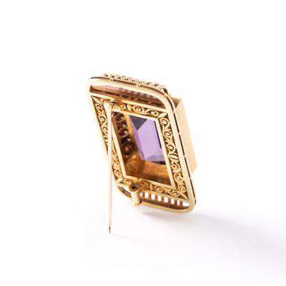 null 14K yellow and 18K white gold brooch centered with a rectangular amethyst (cracked)...