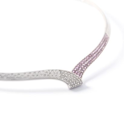 null Set in 18K white gold set with diamonds and pink sapphires consisting of a necklace,...