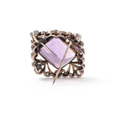 null 18K gold and silver 800‰ pendant brooch centered with an emerald-cut amethyst...