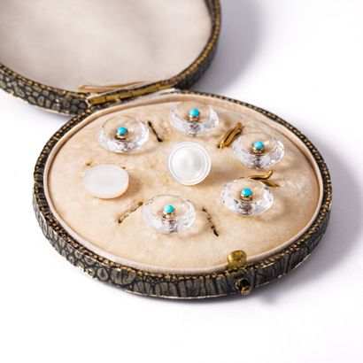 null Plastrons in rock crystal (slight chip) set with turquoise cabochon.

Five buttons....