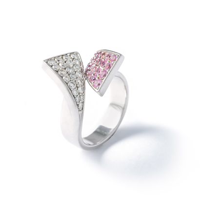 null Set in 18K white gold set with diamonds and pink sapphires consisting of a necklace,...