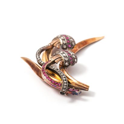 null 14K gold and 800‰ silver brooch set with rose-cut rubies and diamonds.

Accidents...