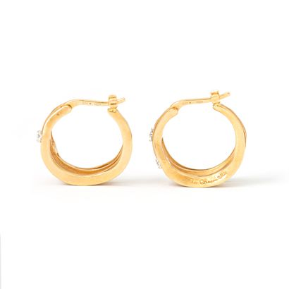 null Annamaria Cammilli

Pair of earrings in 18K yellow gold punctuated with round...