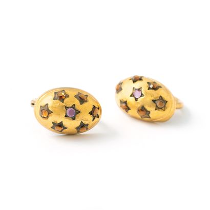 Pair of gold-plated earrings studded with...