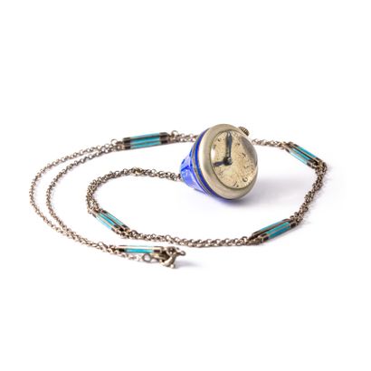 null Silver 800‰ and blue enamel pendant watch (missing) with silver and metal chain.

Late...