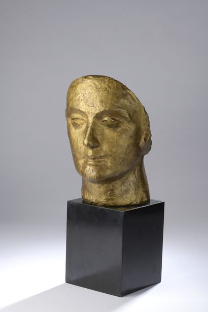 null Othon Coubine (1883-1969) 

Masque de femme

Bronze à patine mordorée Signé...
