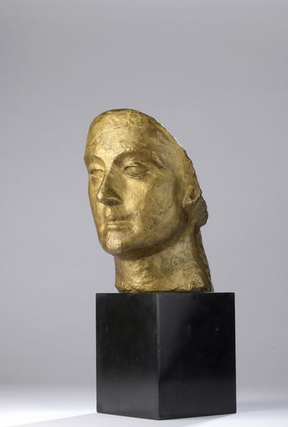 null Othon Coubine (1883-1969) 

Masque de femme

Bronze à patine mordorée Signé...