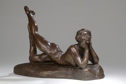 null Jacques Loysel (1867-1925) 

Nu allongé sur le ventre

Bronze à patine brune,...