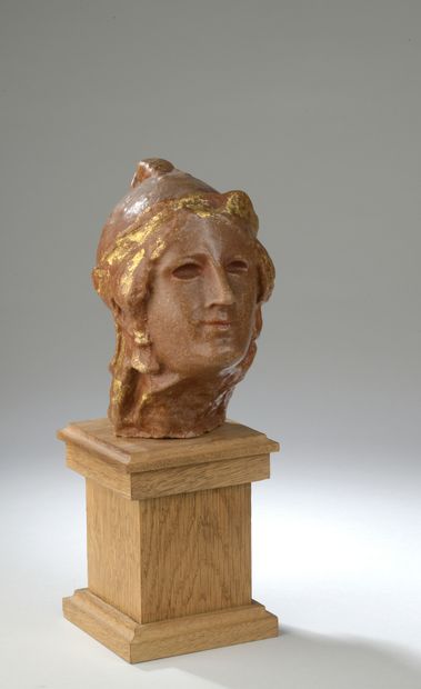 null Paul Gaston Deprez (1872-1941) 

Minerve

Tête en cire rouge rehaussée d’or

H....