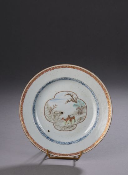 null CHINA 

Plate with polychrome decoration in the center of a scene of a deer...