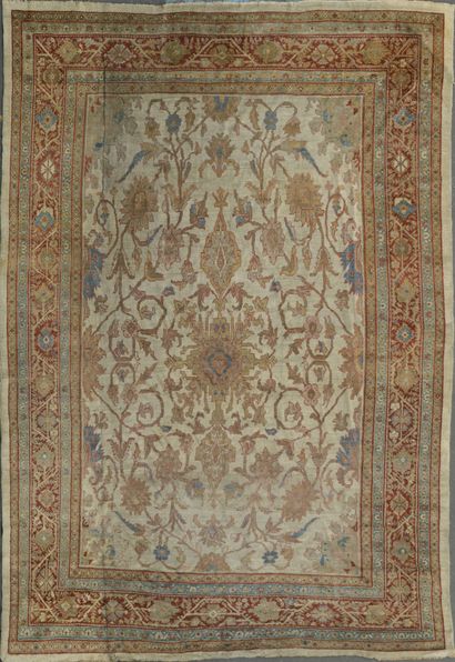 null SMYRNE RUG in wool with floral scrolls on a beige background, wide border with...