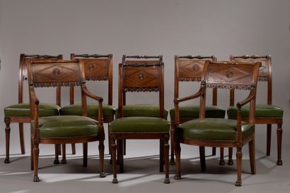null SET OF TWO CHAIRS AND SIX CHAIRS in mahogany and mahogany veneer.

The backrest...