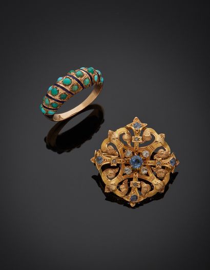null Lot comprising an 18K yellow gold 750‰ round brooch set with blue stones and...