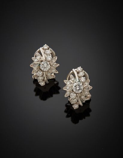 Pair of 18K white gold 750‰ ear clips, decorated...