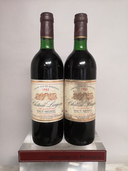 null 2 bottles Château LIEUJEAN - Haut Médoc - 1982

Slightly stained labels. Levels...