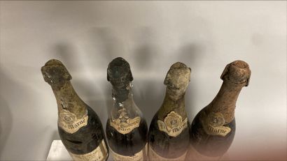 null 4 bouteilles EAUX de VIE DIVERS A VENDRE EN L'ETAT 

FINE MARNE et MARC de CHAMPAGNE...