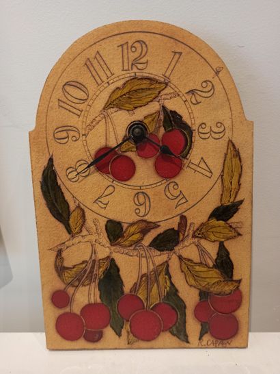 null Roger CAPRON (1922-2006)

Wall clock in red and green enamelled ceramics decorated...