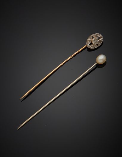 null Two tie pins, one in 18K 750‰ white gold set with a button-shaped cultured pearl,...