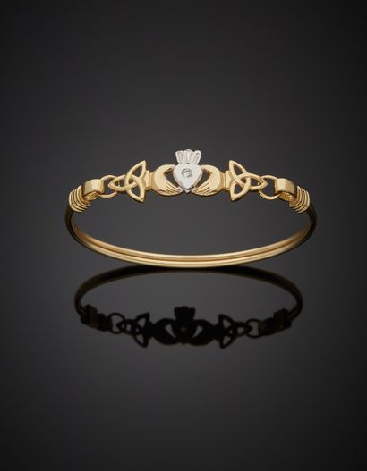 null Two-tone 9K gold bracelet 375‰, stiff, adorned with a heart motif set with a...