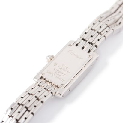 null CARTIER- Ladies' wristwatch in 18K white gold 750‰, Tank model, rectangular...