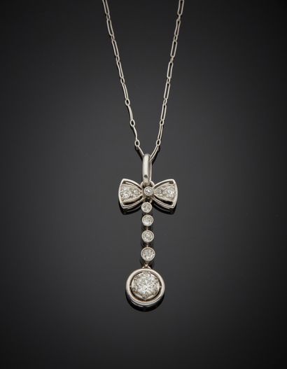 null Platinum 850‰ bow-shaped pendant set with old-cut diamonds on its 18K 750‰ white...