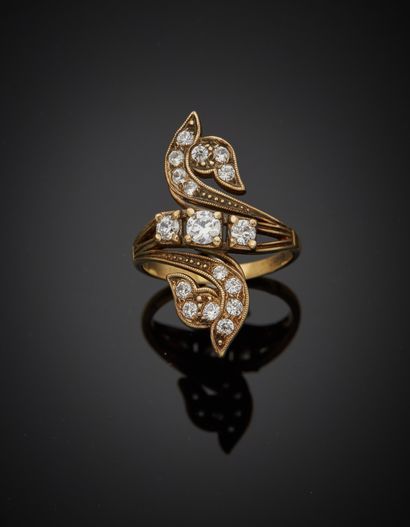null Lot comprising:

- Three 18K yellow gold 750‰ rings, set with white and green...