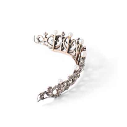 null 
9K rose gold 375‰ and silver 2nd title 800‰ tiara, adorned with garlands and...
