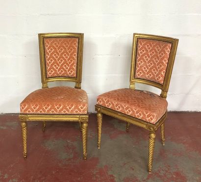 Pair of chairs in carved and gilded wood...