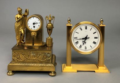 Gilt bronze and chased clock representing...