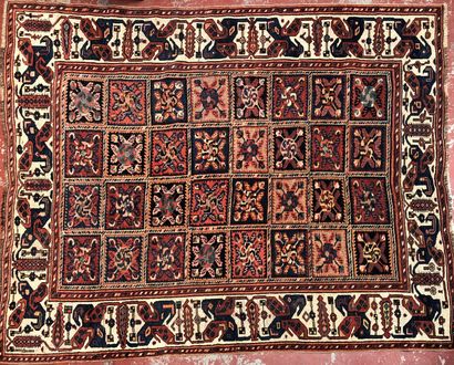 Set of three carpets, one with a motif of...