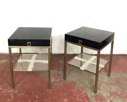 
Pair of black lacquered bedside tables opening...