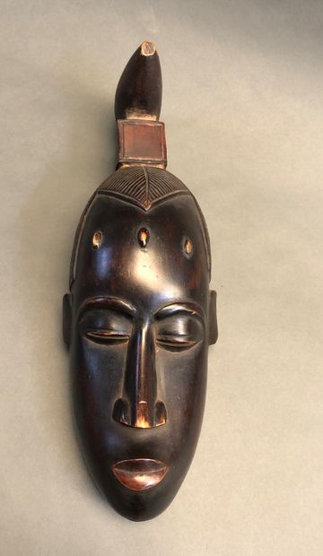  Mannette including : 
- Gouro type mask, Ivory Coast, wood with black brown patina...