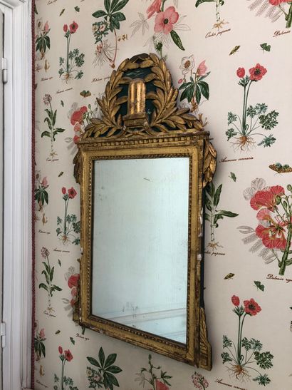 null Carved and gilded wood window with a truncated column in pediment. 

Louis XVI...