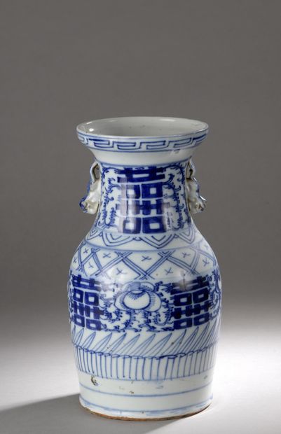 null Porcelain wedding vase of baluster form, decorated in blue underglaze with double...
