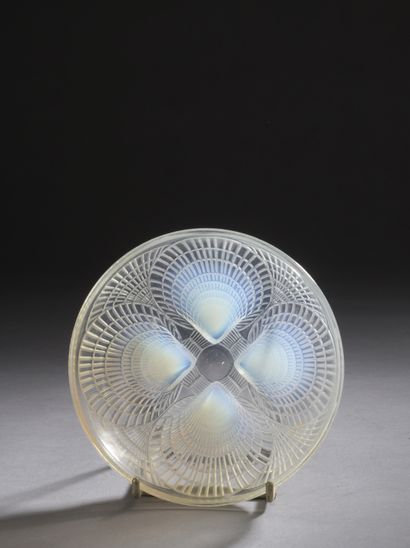 R. LALIQUE 
Cup out of pressed opalescent...