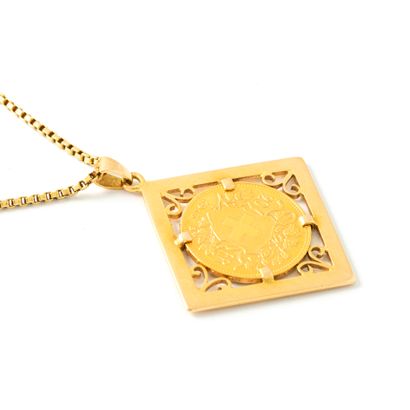 null 18K yellow gold 750‰ pendant holding a 20 Swiss franc Vreneli-Helvetia coin....