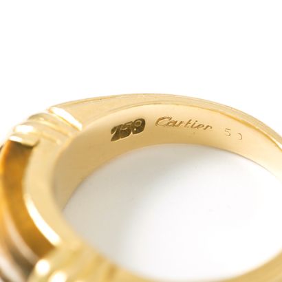 null Cartier (attributed to). 18K yellow gold 750‰ ring centered with a godronné...