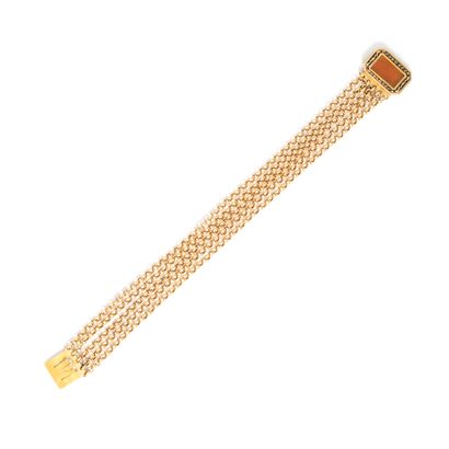  Bracelet en or jaune 18K 750‰ composé de cinq chaines et d'un fermoir centré d'une...