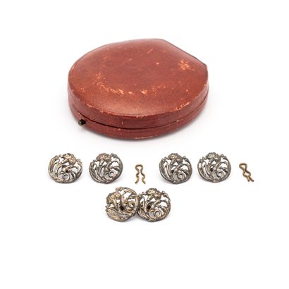 null Set of six gray metal buttons with five gold metal fasteners.

Art Nouveau....