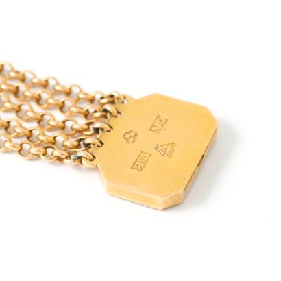 null Bracelet en or jaune 18K 750‰ composé de cinq chaines et d'un fermoir centré...