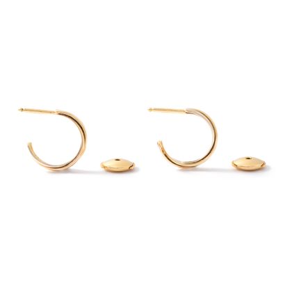 null Cartier (attributed to). Trinity. Pair of 18K yellow, white and rose gold 750‰...