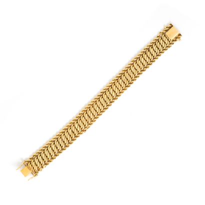 null Bracelet in 18K yellow gold 750‰ braided. Safety eight.

Circa 1950.

Length:...