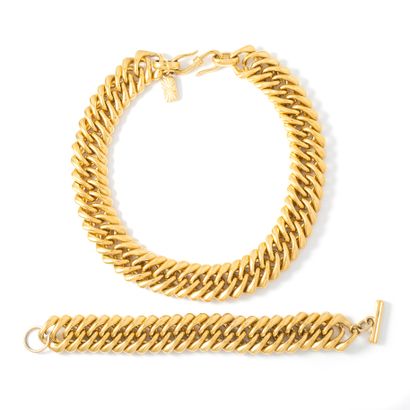 null Yves Saint Laurent. Collier et Bracelet en métal doré.

Longueur du collier:...