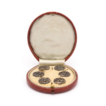 null Set of six gray metal buttons with five gold metal fasteners.

Art Nouveau....