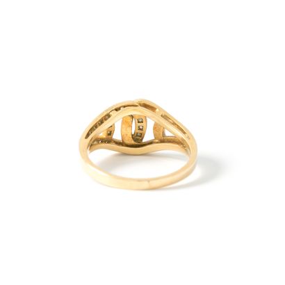 null Cartier (attributed to). 18K yellow gold 750‰ ring set with round diamonds.

Bears...
