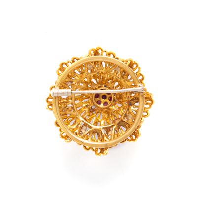 null 18K yellow and white gold 750‰ brooch set with 8/8 cut diamonds and red stones.

Circa...