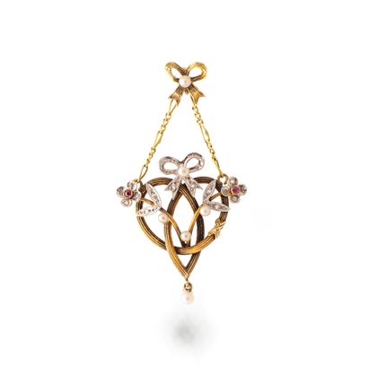 null Platinum 900‰ and 18K yellow gold 750‰ pendant set with rose-cut diamonds, rubies...