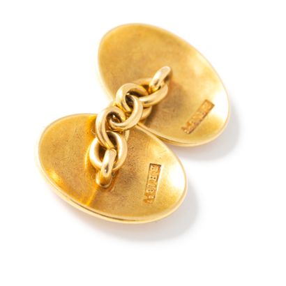 null Pair of 18K yellow gold 750‰ enameled cufflinks.

English hallmarks.

Circa...