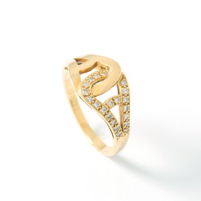 null Cartier (attributed to). 18K yellow gold 750‰ ring set with round diamonds.

Bears...